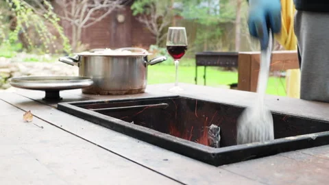 The process of cooking kebab on a table with a built-in barbecue, dinner outdoor Video stock 274176012