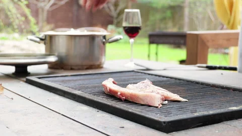 The process of cooking kebab on a table with a built-in barbecue, dinner outdoor Video stock 274176145