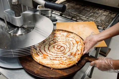Process of cooking, making, baking pizza. Close up. Restaurant, cafe or pizze Stock Photos