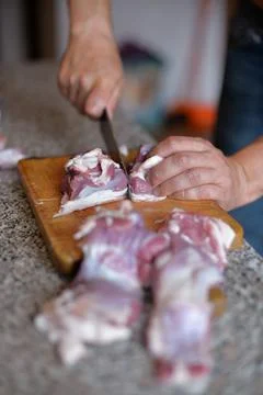 The process of cooking meat with vegetables wrapped in foil, on the grill at  Stock Photos