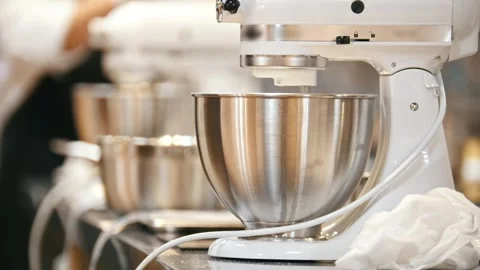 Process of cooking meringue whipped egg whites on mixer whisk Stock Footage 326850387