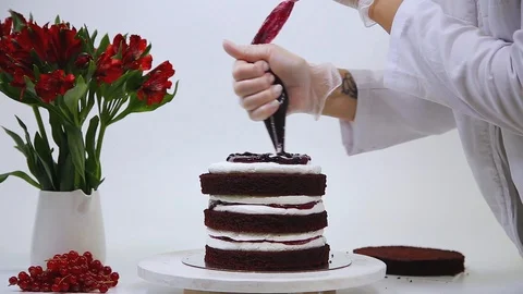 The process of cooking multilayered birthday cake, Stock-Footage 106614579