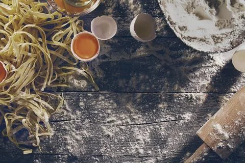 Process of cooking pasta with raw fresh ingredients for classic italian foo.. Stock Photos