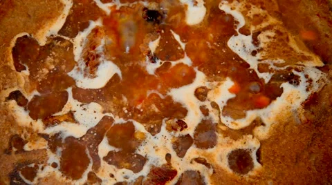 The process of cooking pilaf. Boiling Stockbeeldmateriaal 65450584