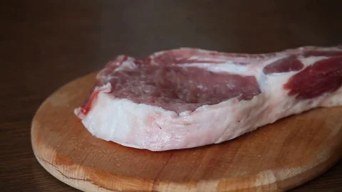 The process of cooking pork loin for frying Video stock 76466771