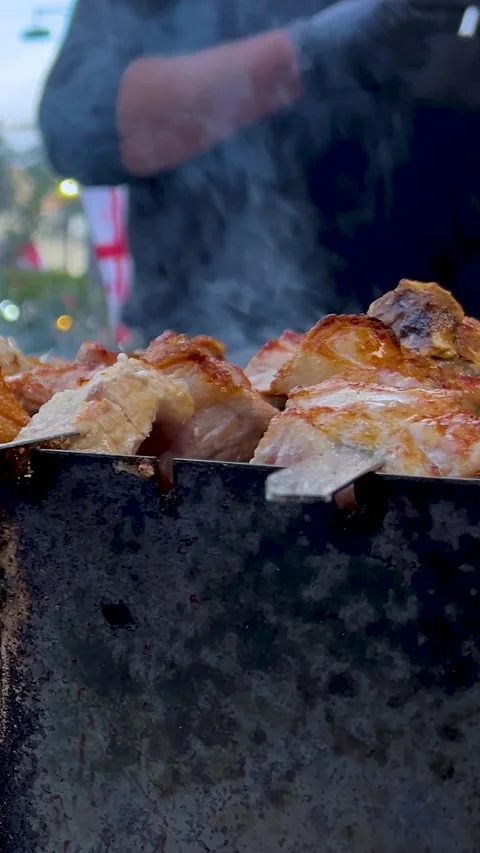 Process of cooking pork meat, beef, chicken shashlik on coals with smoke Stock Footage 319964395