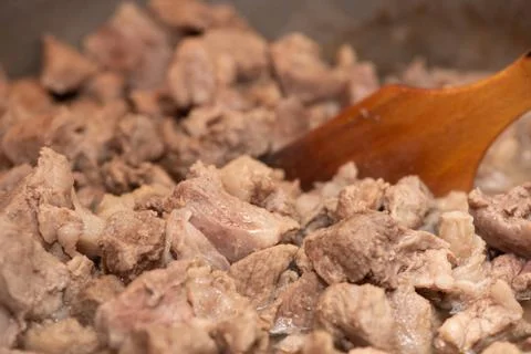Process of cooking pork stew, close-up. Homemade cooking, traditional Photos