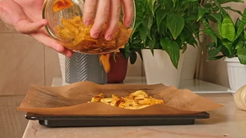 Process of cooking potatoes rustic. Slicing potatoes. Mix spices, oil. Bake on Stock Footage 244720938