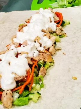 The process of cooking Shawarma from chicken meat at home. we cook at home Stock Photos