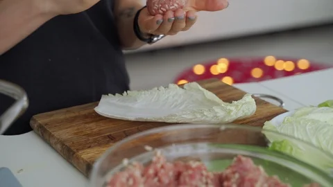 Process of cooking stuffed cabbage rolls with meat and rice. Видео 102178588