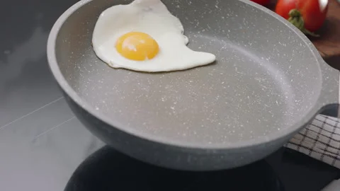 Process of cooking sunny side up fried egg. Stock Footage 311801289