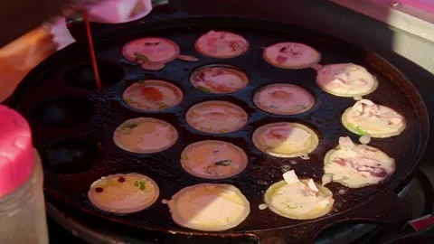 The Process of Cooking Takoyaki Stock Footage 253302820