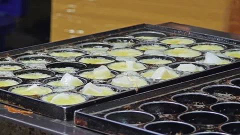 The process of cooking Takoyaki. Stock Footage 304647137