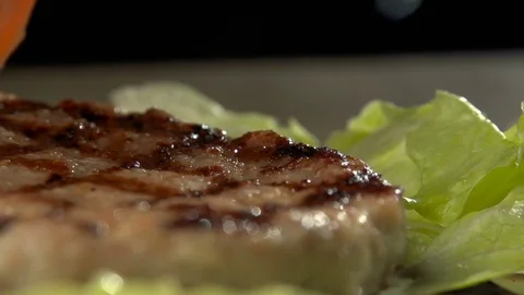 Process of cooking tasty hamburger slow motion Stock Footage 81688712