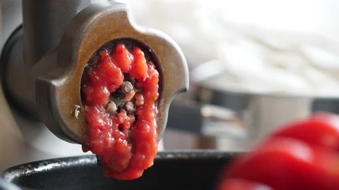 Process of cooking tomato paste in meat grinder Stock-Footage 117060151