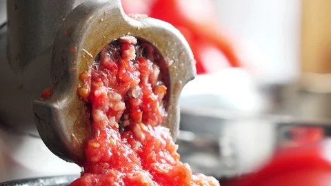 Process of cooking tomato paste in meat grinder Stock-Footage 118260143