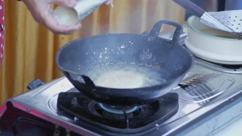 The process of cooking traditional Indonesian snacks, namely chicken stomac.. Stock Footage 243636770