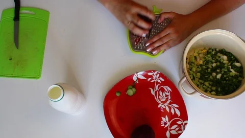 The process of cooking vegetable soup without cooking. Stock Footage 89448843