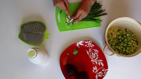 The process of cooking vegetable soup without cooking. Stock Footage 89449463