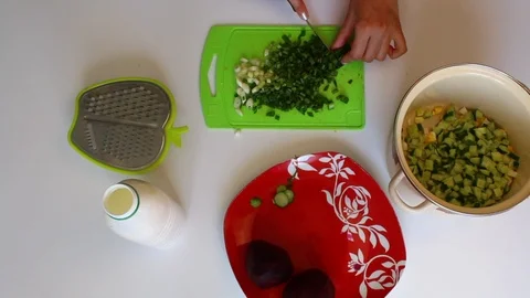 The process of cooking vegetable soup without cooking. Stock Footage 89449484