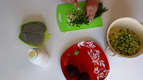 The process of cooking vegetable soup without cooking. Stock Footage 89449906