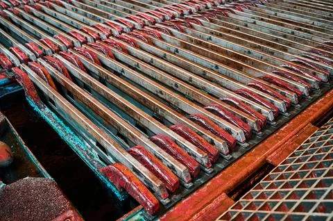 Process of copper refinement in electrolysis bath at plant Stock Photos