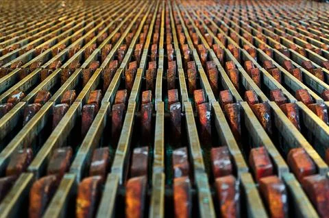 Process of copper refinement in electrolysis bath at plant Stock Photos