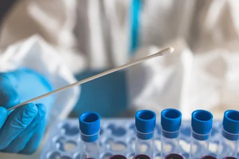 Process of coronavirus PCR antigen testing examination by nurse medic in labo Фото