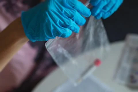 Process of coronavirus testing examination at home, COVID-19 swab collection  Stock Photos