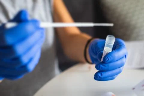 Process of coronavirus testing examination at home, COVID-19 swab collection  Stock Photos
