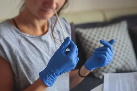 Process of coronavirus testing examination at home, COVID-19 swab collection  Stock Photos