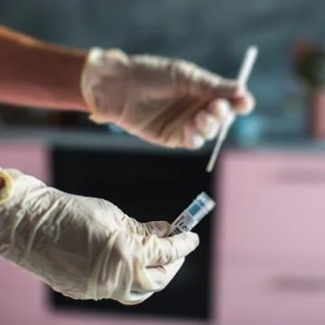 Process of coronavirus testing examination at home, COVID-19 swab collection  Stock Photos
