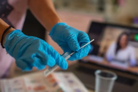 Process of coronavirus testing examination at home, COVID-19 swab collection  Foto stock