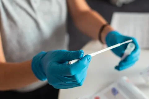 Process of coronavirus testing examination at home, COVID-19 swab collection  Stock Photos