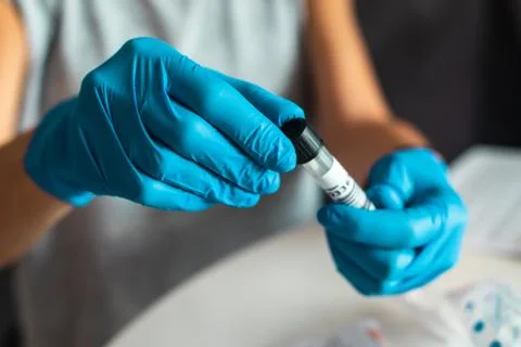 Process of coronavirus testing examination at home, COVID-19 swab collection  Stock Photos