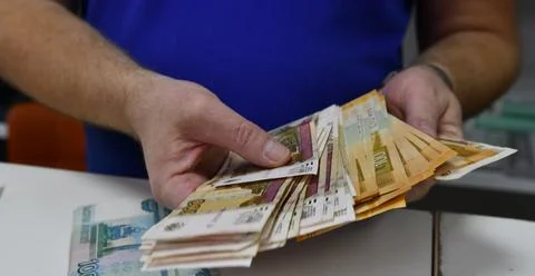 The process of counting money Stock Photos