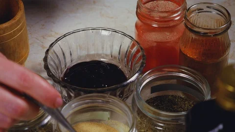 The process of crafting a barbecue sauce with spices Stock Footage 103461817