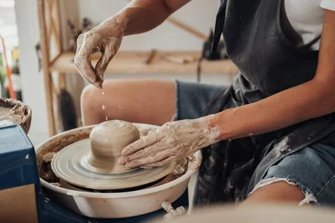 Process of Creating Clay Pot, Unrecognisable Female Master Working on a Pottery Stock Photos