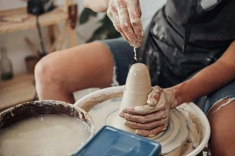 Process of Creating Clay Pot, Unrecognisable Female Master Working on a Pottery 写真素材