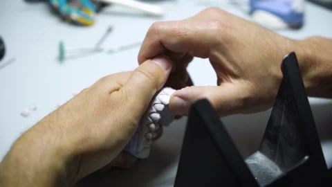 The process of creating a dental crown and impression by a dental technician. Vídeo Stock 208882481