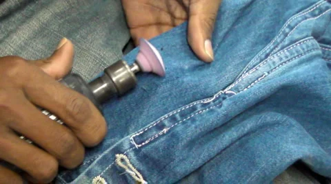 Process of Creating Destroyed/Designer Jeans Video stock 5191595