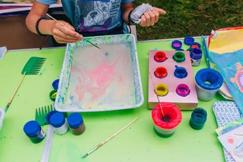 Process creating drawings in ebru technique Stock Photos