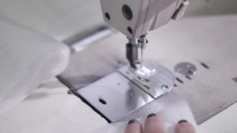 The process of creating from fabric in an electric sewing machine Stock-Footage 240757264