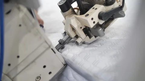 The process of creating from fabric in an electric sewing machine Stock-Footage 240757471