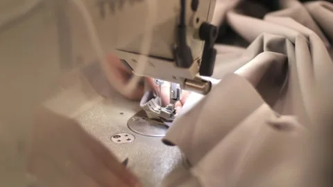 The process of creating from fabric in an electric sewing machine Stock-Footage 240757497
