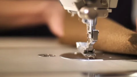 The process of creating from fabric in an electric sewing machine Stock-Footage 240757521