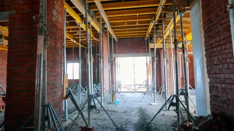The process of creating a floor. Formwork flooring. Exterior of a building under Stock Footage 192316983