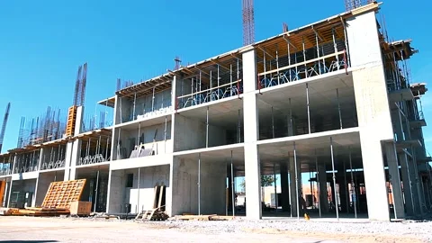 The process of creating a floor. Formwork flooring. Interior of a building under Stock Footage 212429508