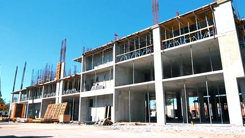 The process of creating a floor. Formwork flooring. Interior of a building under Stock Footage 212429562