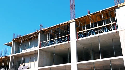 The process of creating a floor. Formwork flooring. Interior of a building under Stock Footage 212429639